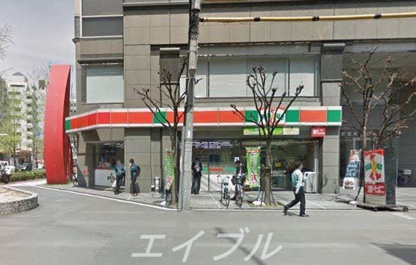 サンクス大阪西本町店(コンビニ)まで51m エスライズ西本町Ⅱ
