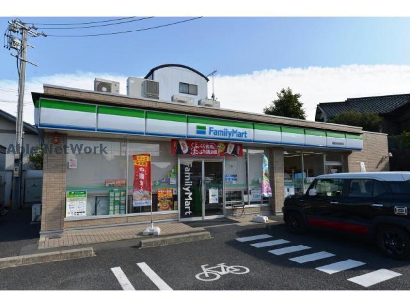 ファミリーマート尾張旭吉岡町店(コンビニ)まで670m プラムコート