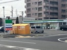 ファミリーマート港油屋町店(コンビニ)まで857m サニープレイス十一屋　C棟