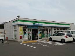 ファミリーマート 鶴市明見店(コンビニ)まで268m レジデンス一本松 A棟