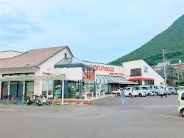 マルナカ 飯山店(スーパー)まで2044m メンバーズタウン讃岐富士Ｂ