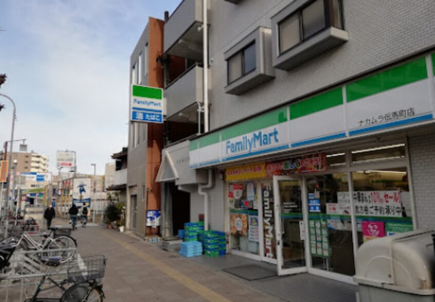 ファミリーマート ナカムラ伝馬町店(コンビニ)まで1110m 植村ビル