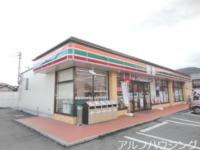 セブンイレブン可児土田中町店(コンビニ)まで992m シャトー　グレイス