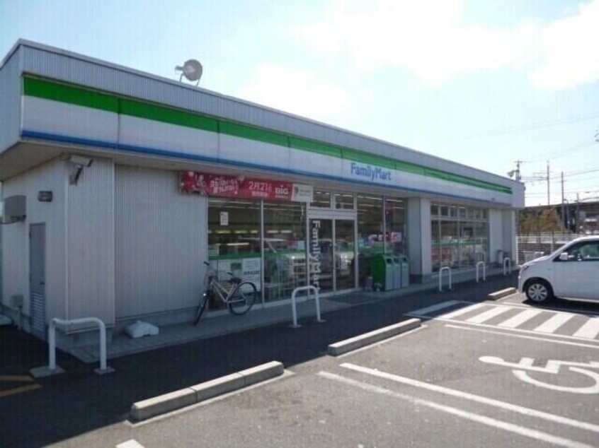 ファミリーマート津岩田店(コンビニ)まで1200m サウスアベニュー・エヌ