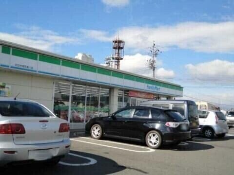 ファミリーマート四日市東阿倉川店(コンビニ)まで653m タウニ－２１