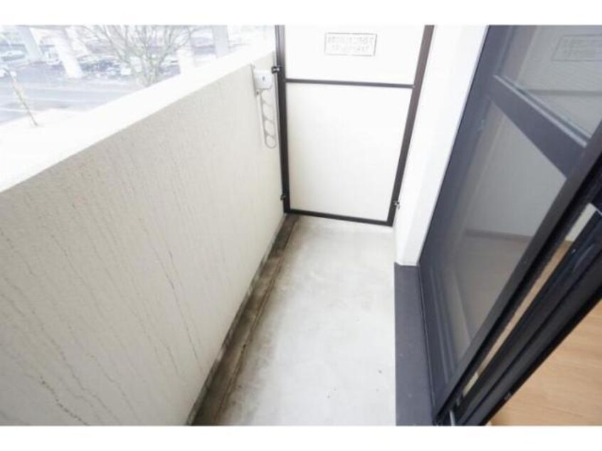 暖かな日差しのふりそそぐバルコニー A・City七条