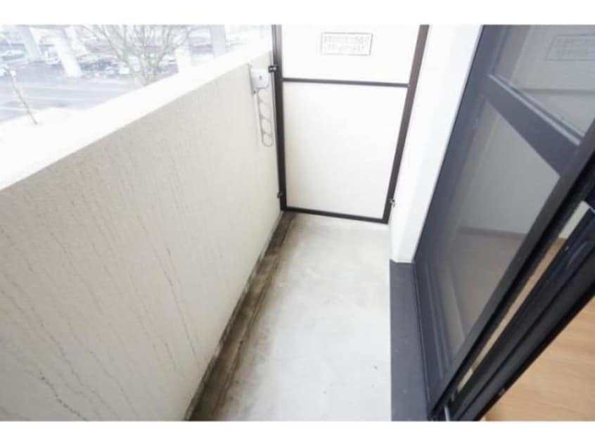 暖かな日差しのふりそそぐバルコニー A・City七条