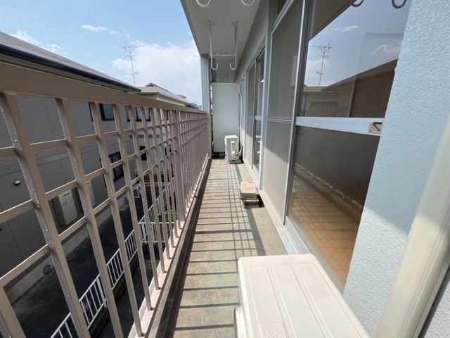 暖かな日差しのふりそそぐバルコニー エクセルハイム